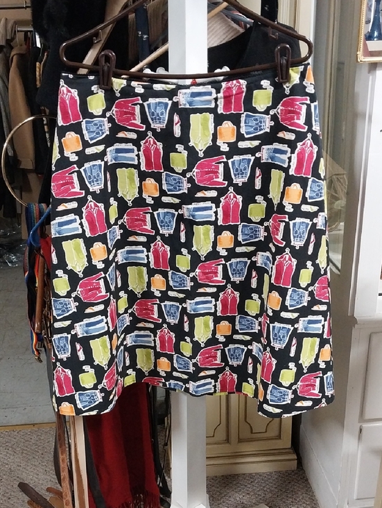 Valerie Stevens Dresses & Skirts - Valerie Stevens Black A-Line Skirt with Red, Blue, Green & Orange Wardrobe Print